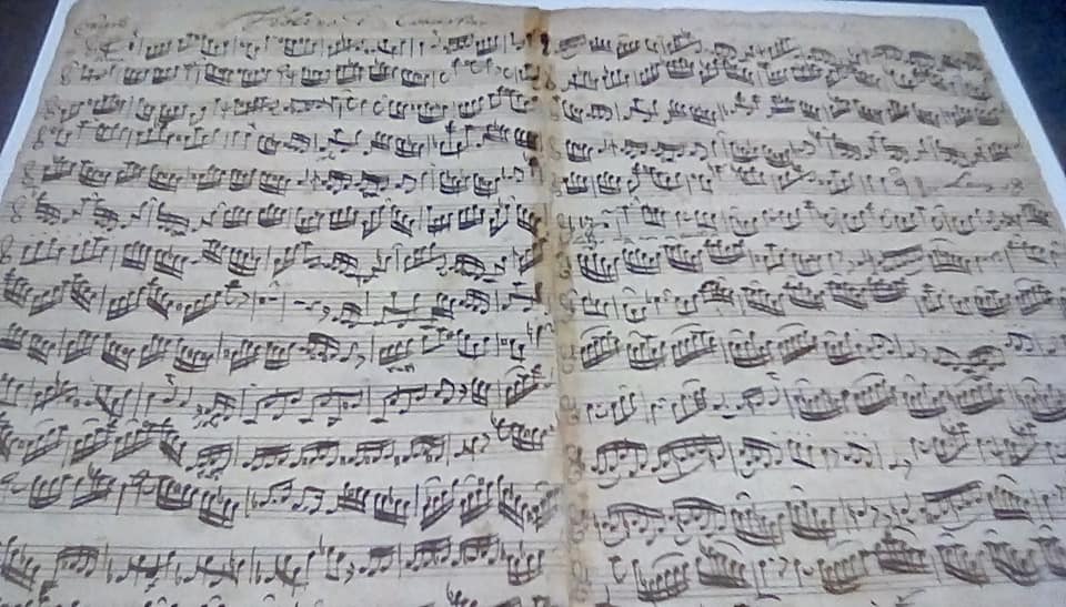 Photo of musical score for Bach's double violin concerto in his own hand