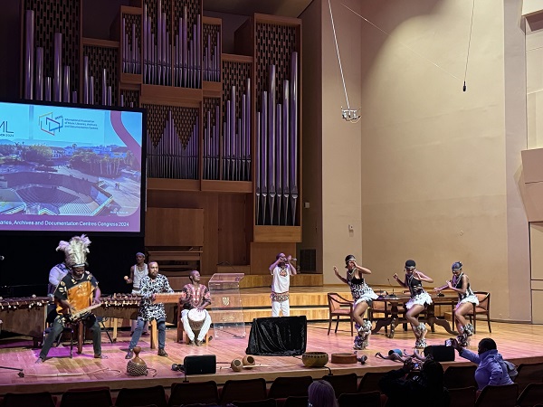 Professor Dizu Plaatjies with his band of musicians and dancers at the opening ceremony