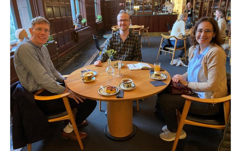 Café at the National Library of Norway. From left to right: Niklas Persson, Joakim Lilljegren and Güneş Çetinkaya Şerik. | Photo © Pia Shekhter.